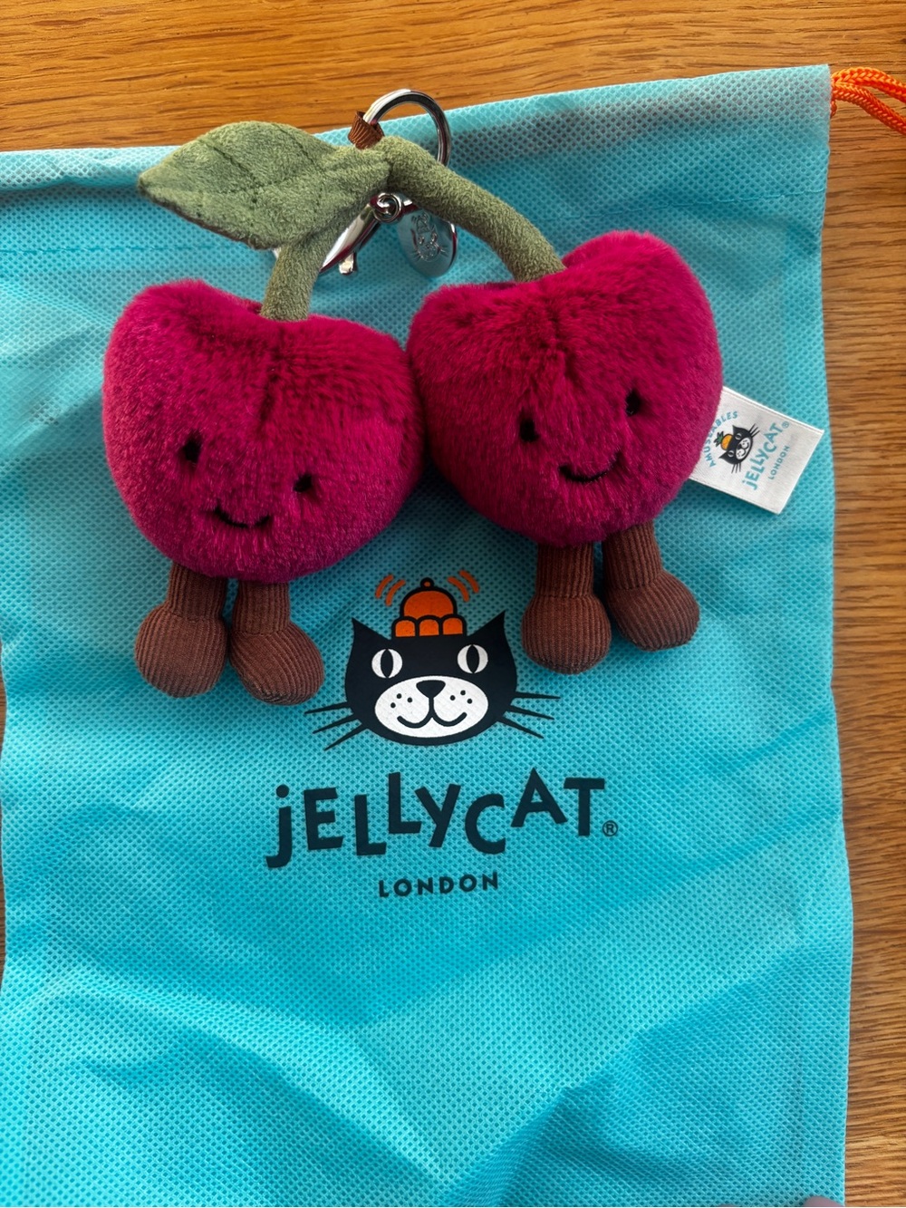 Jellycat Magenta Cherry Bag Charm with Brown Legs